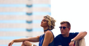 man and woman sitting posing for photo