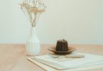 brown and black chocolate cake on white ceramic plate