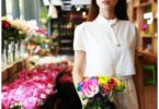 woman holding flower bouquet