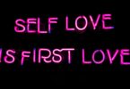 a neon sign that says self love is first love